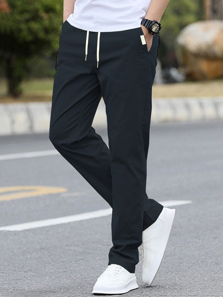 Pantalons de loisirs sportifs pour hommes avec taille élastique et poches latérales modernes Avriane