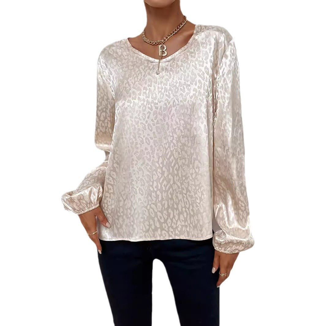 Blouse élégante pour femmes avec un col en V moderne et un motif orné Levoire