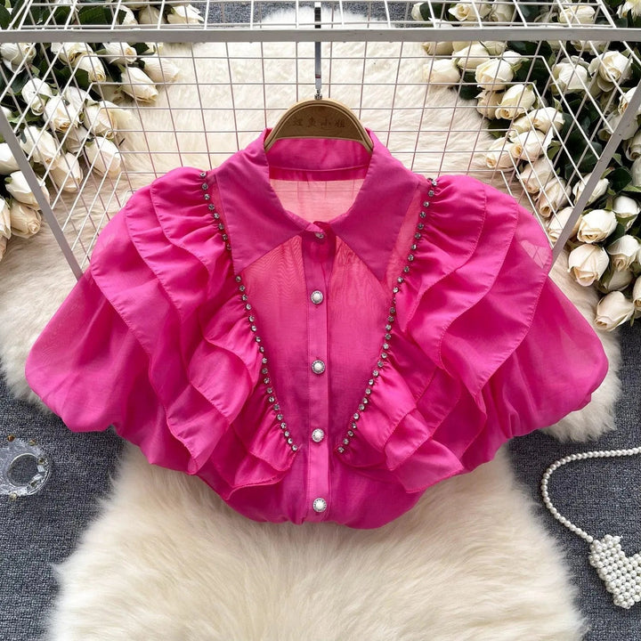 Levoire | Top avec des diamants transparents et fins et des manches bouffantes Rosenrot Taille libre