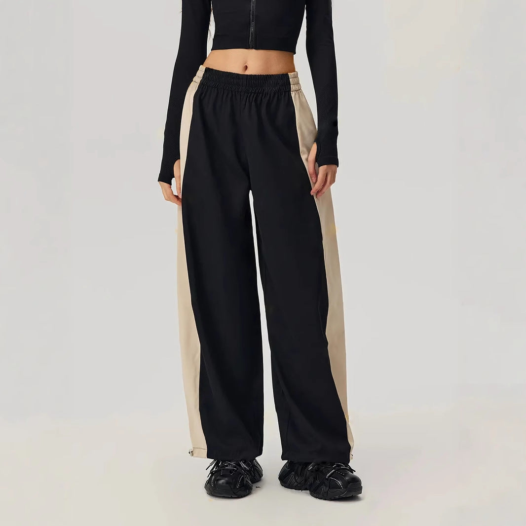 Pantalons de loisirs sportifs pour femmes avec coupe tendance et panneaux contrastés sur les côtés Levoire