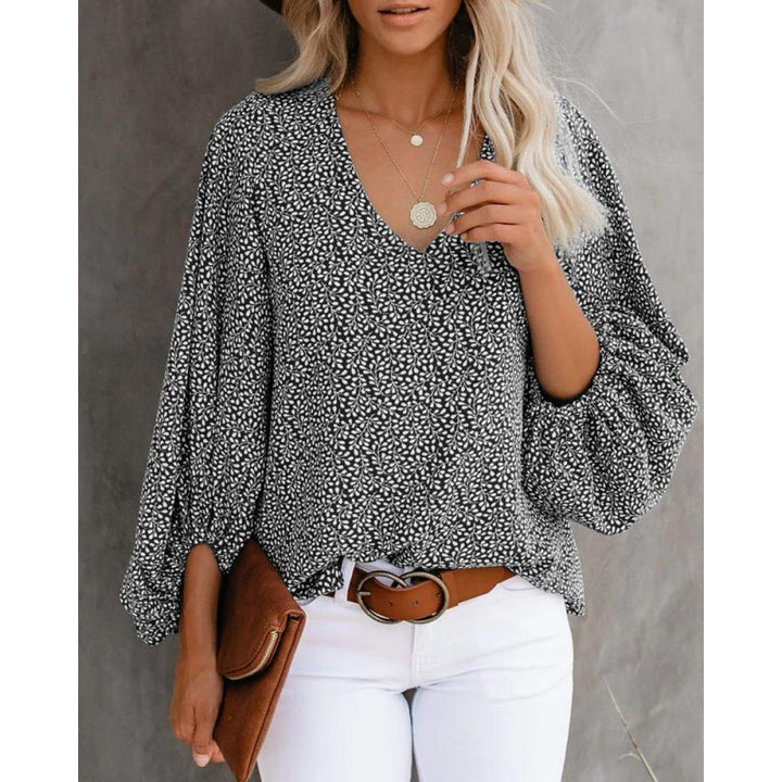 Blouse féminine à la mode avec des manches larges et un col en V Levoire