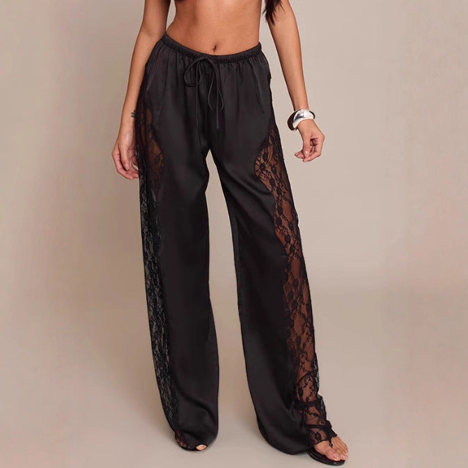 Pantalons en satin élégants pour femmes avec des inserts en dentelle et des découpes latérales Levoire