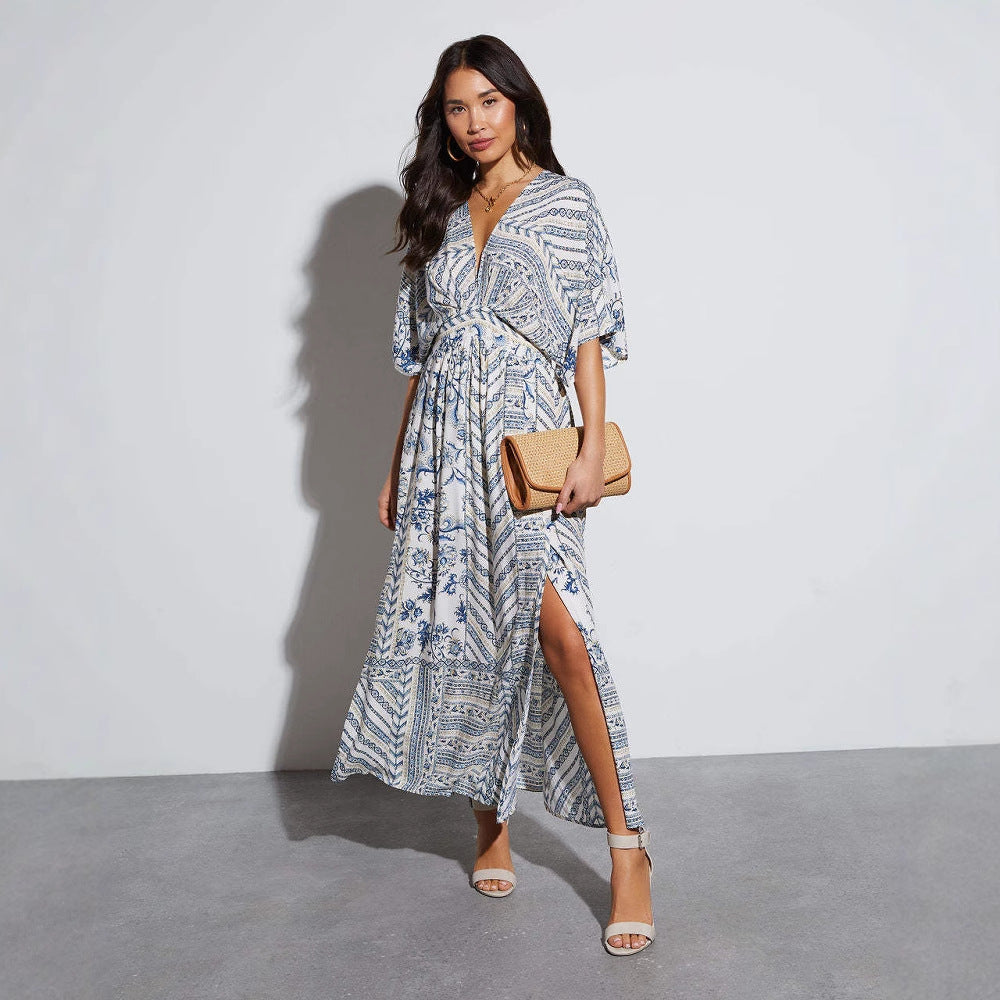 Robe maxi femme avec un élégant décolleté en V, fente sur le côté et motif floral Levoire