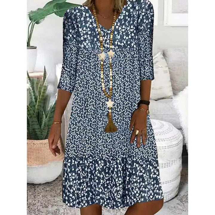 Levoire | Robe midi à col en V avec manches trois quarts à imprimé élégant