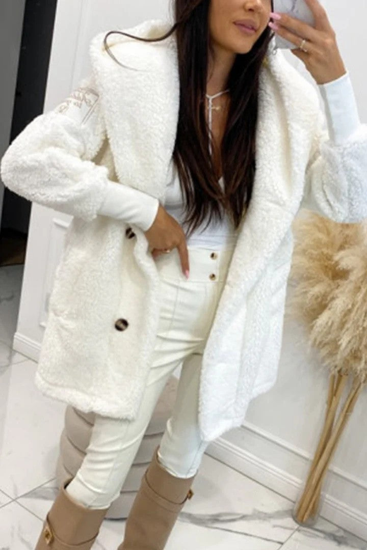 Veste en fourrure teddy pour femmes avec col classique et poches pratiques Levoire