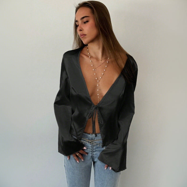 Blouse élégante femme avec décolleté en V profond et détail de nœud décontracté Levoire