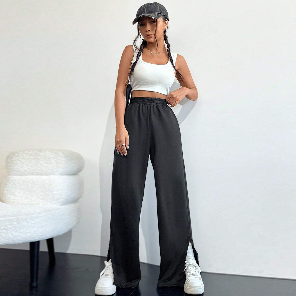 Pantalons satinés larges pour femmes avec taille élastique et fentes latérales Levoire