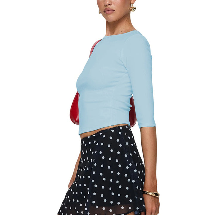 Chemise à manches longues cropped pour femmes avec un décolleté rond élégant et une coupe qui met en valeur la silhouette Levoire