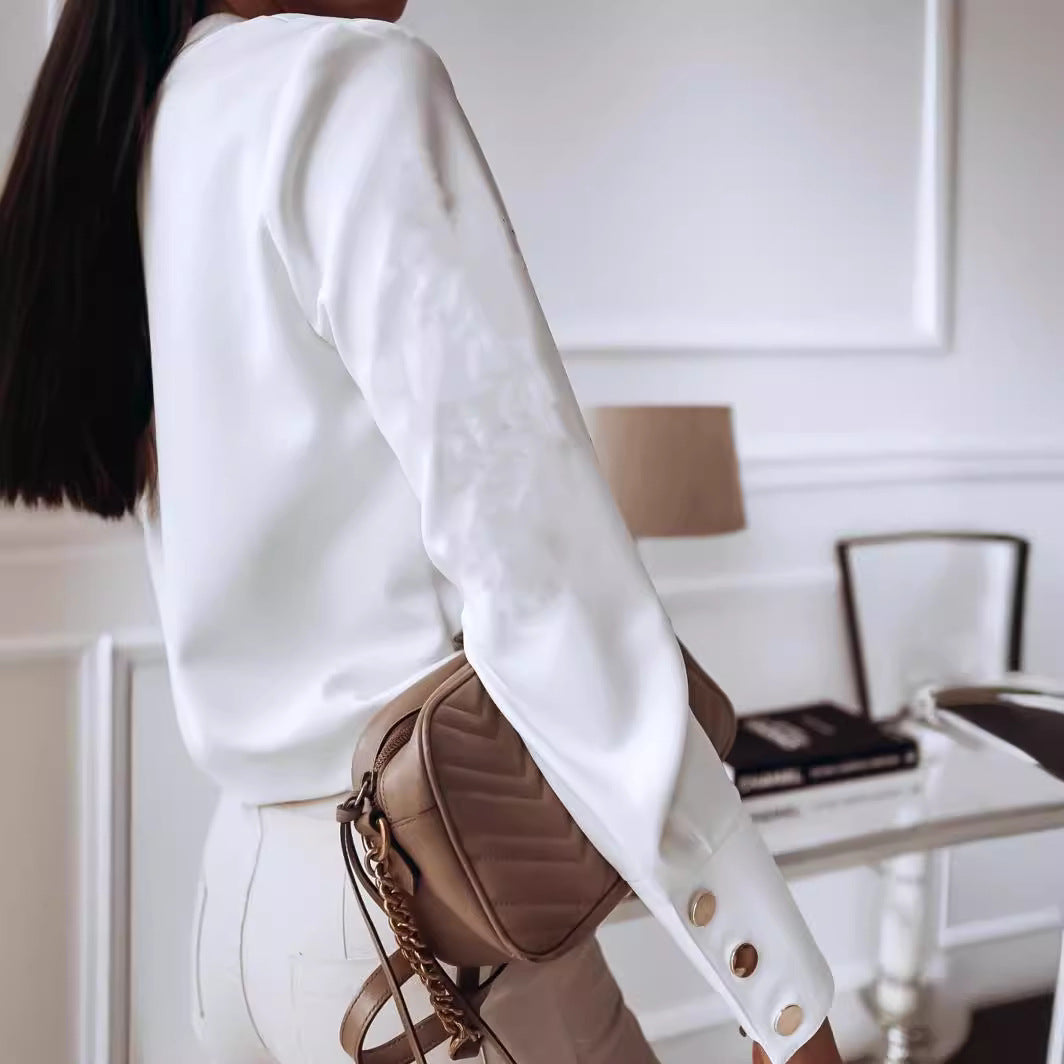 Blouse élégante pour femmes avec des boutons-pression modernes et une coupe décontractée Levoire