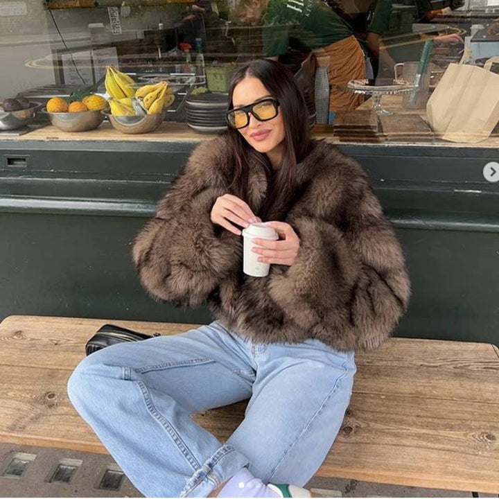 Dames manteau en fausse fourrure avec de longues manches douces Avriane