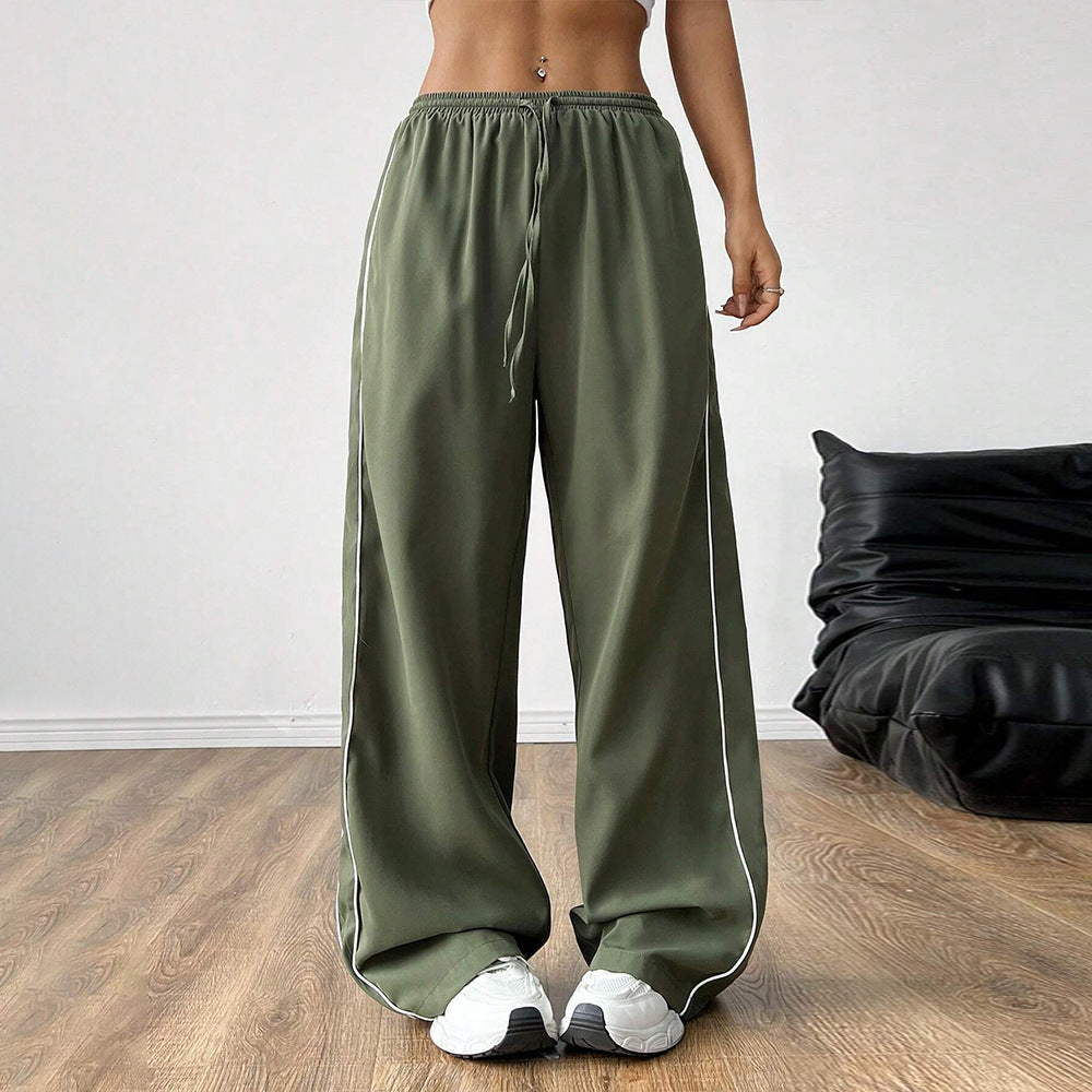 Pantalons de sport amples pour femmes avec taille élastique et bandes latérales élégantes Levoire