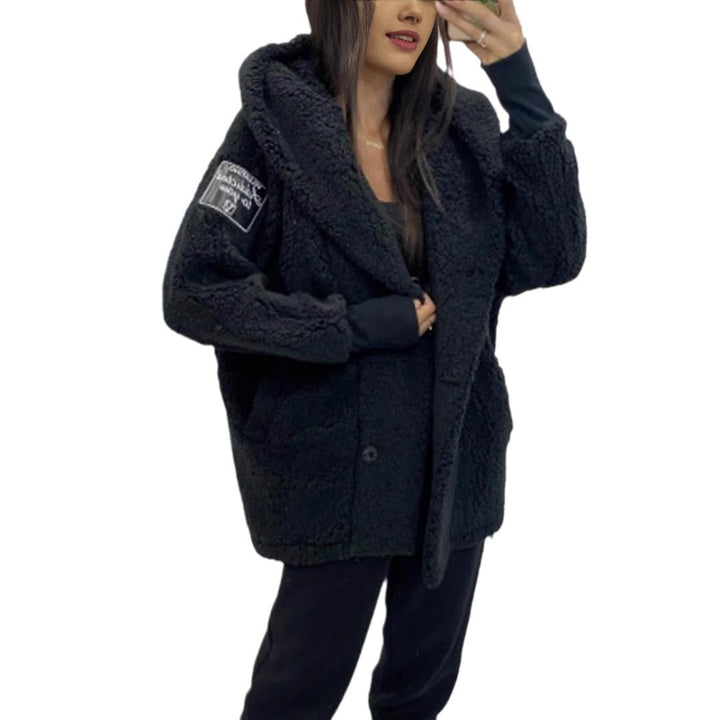 Veste en fourrure teddy pour femmes avec col classique et poches pratiques Levoire