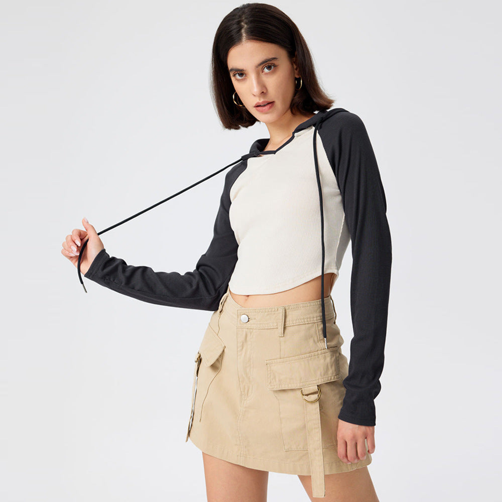 Top de sport court pour femmes avec capuche et manches longues Levoire