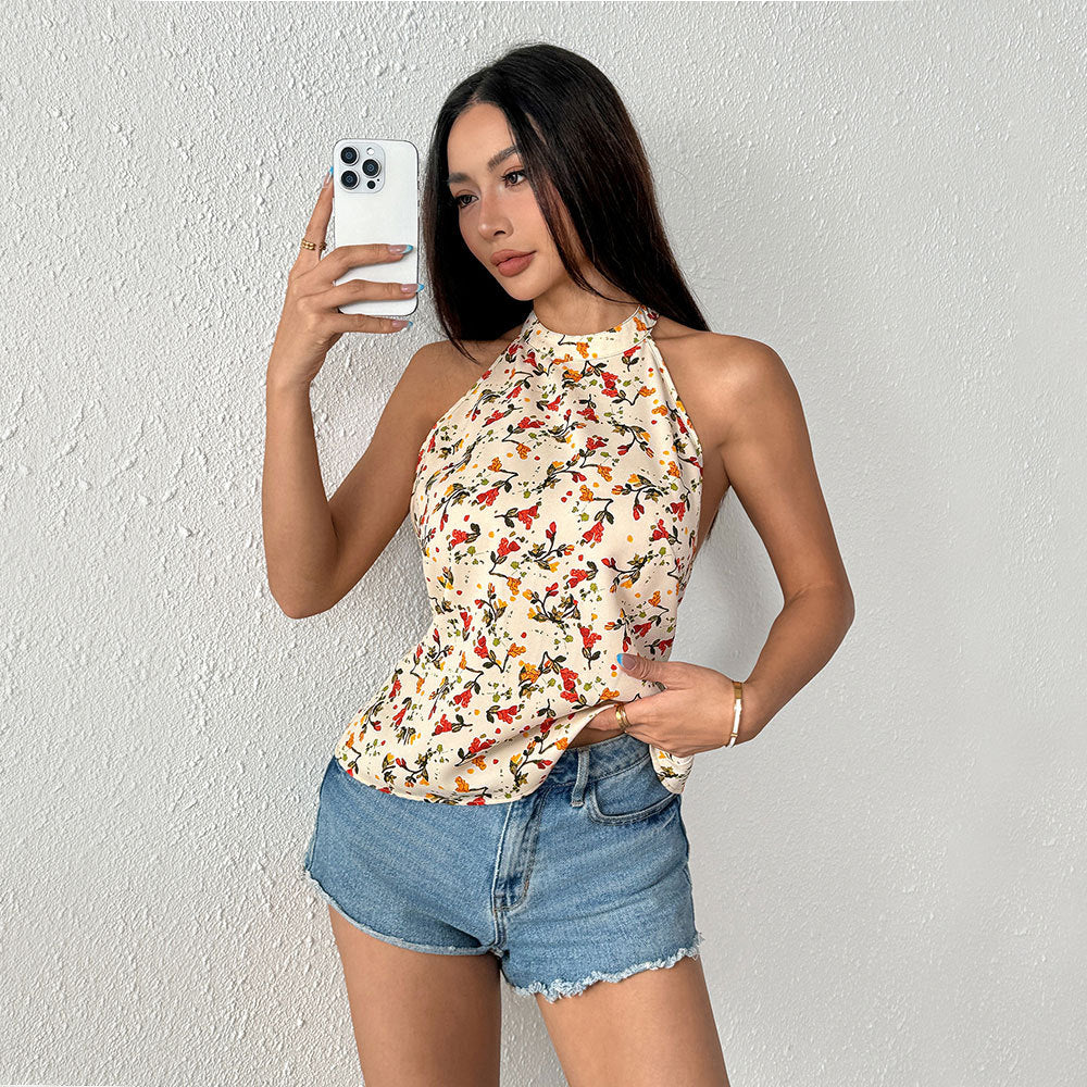 Haut à bretelles féminin avec design floral et ourlet flottant Levoire