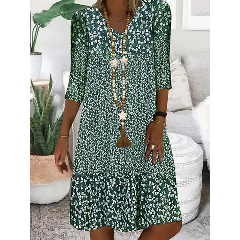 Levoire | Robe midi à col en V avec manches trois quarts à imprimé élégant