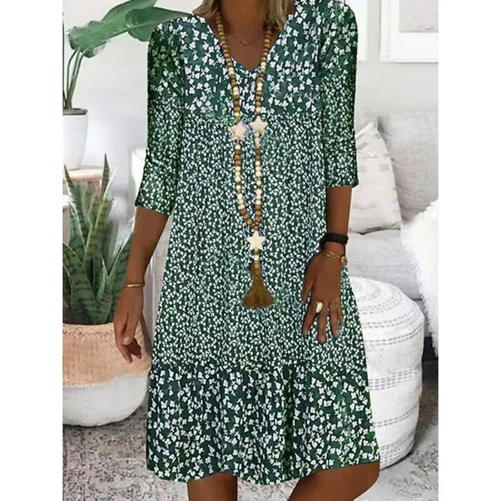 Levoire | Robe midi à col en V avec manches trois quarts à imprimé élégant