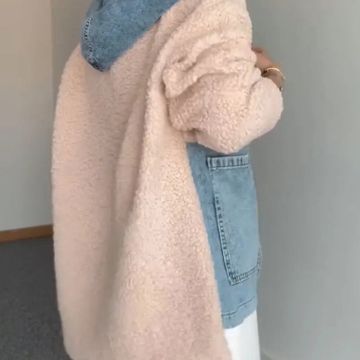 Veste de transition pour femmes avec un matériau extérieur en polaire confortable et des boutons-pression pratiques Levoire