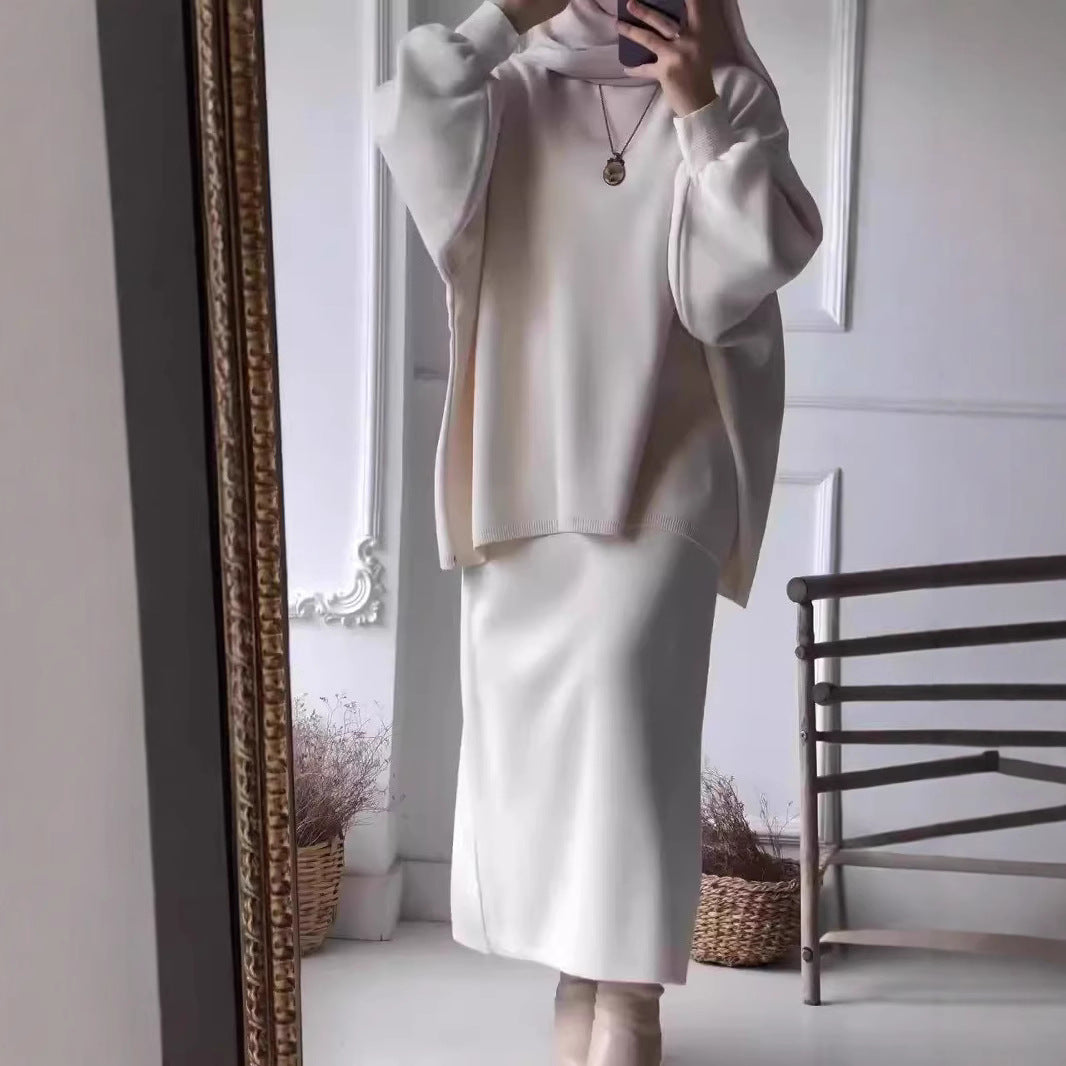 Ensemble élégant femme en deux pièces avec découpe asymétrique et manches volumineuses Levoire