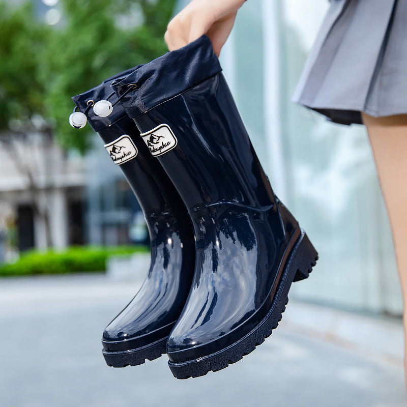 Femmes Bottes en caoutchouc de haute qualité et stylées avec système de lacets réglable Avriane