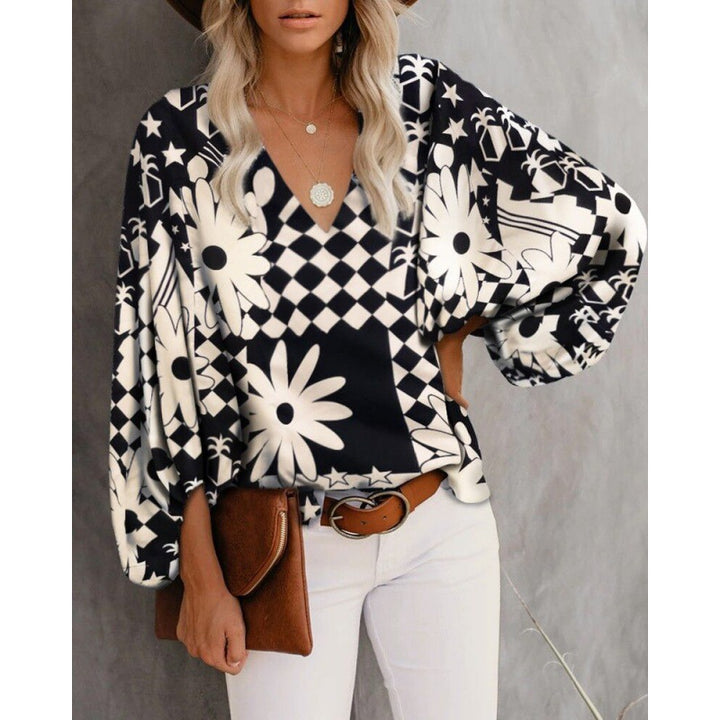 Blouse féminine à la mode avec des manches larges et un col en V Levoire