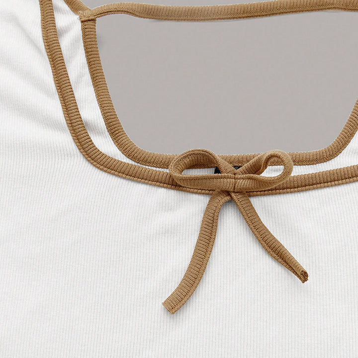 Haut à manches longues cropped pour femmes avec un décolleté carré élégant et des détails de nœud sophistiqués Levoire