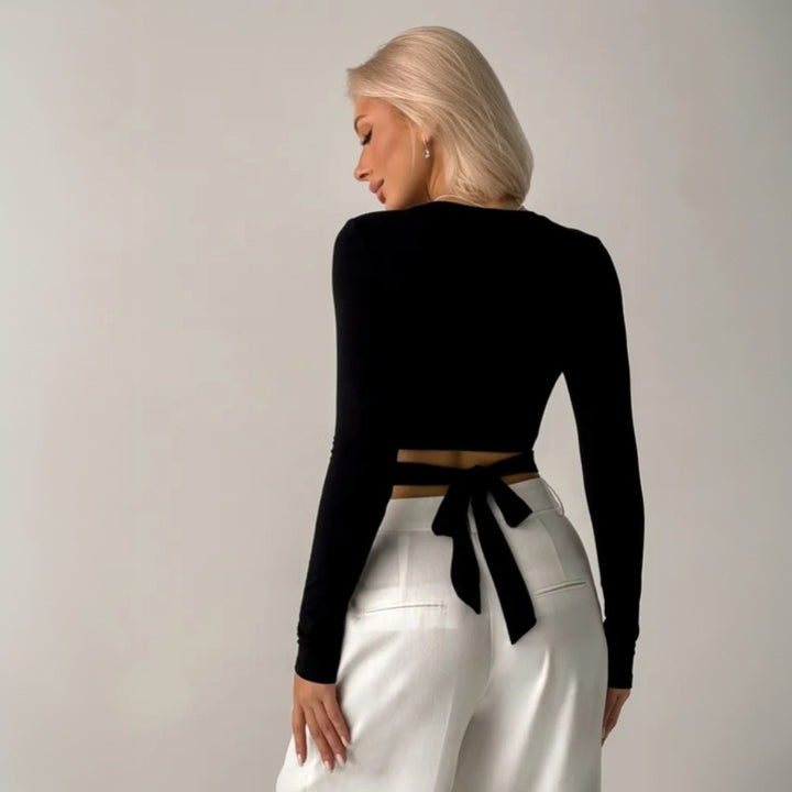 Chemise à manches longues courte pour femme avec design innovant à découpes et taille élastique Levoire