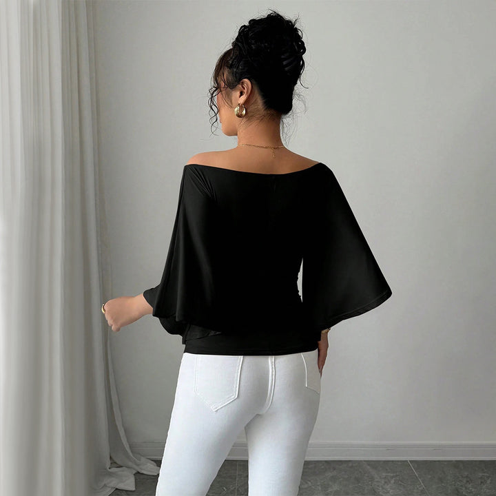 Haut élégant femme à épaules dénudées avec manches larges et coupe ajustée Levoire