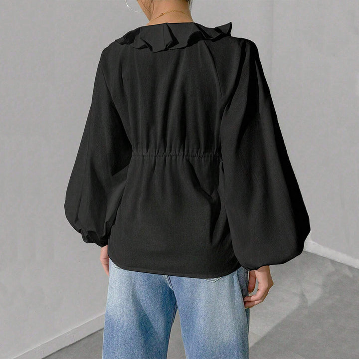 Chemisier style blouse pour femmes avec des manches volumineuses et des détails en volants Levoire