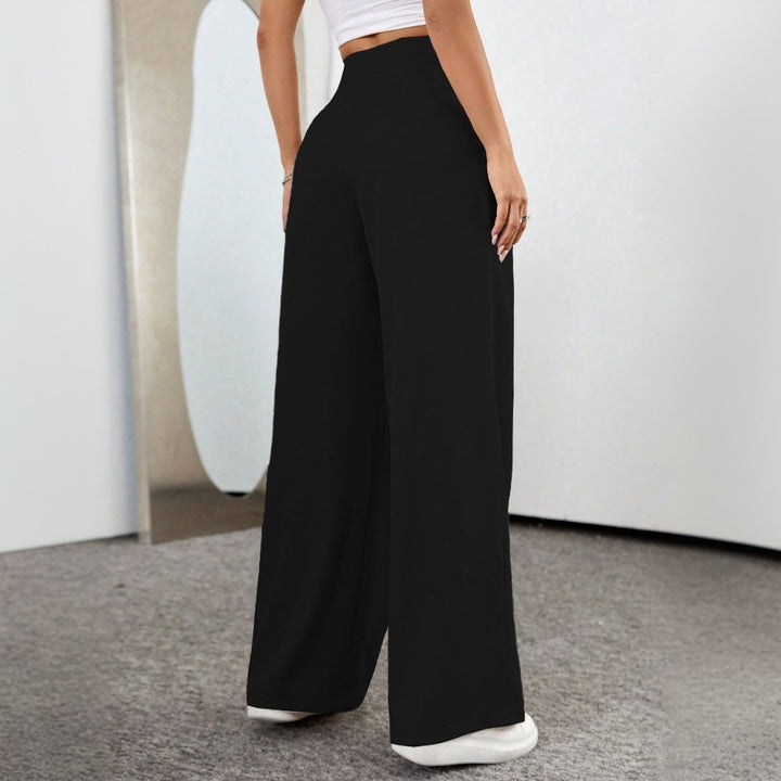 Pantalons palazzo taille haute généreux pour femme avec plis élégants et bouton visible Levoire