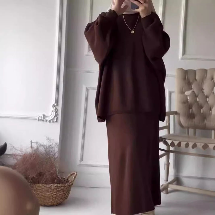 Ensemble élégant femme en deux pièces avec découpe asymétrique et manches volumineuses Levoire