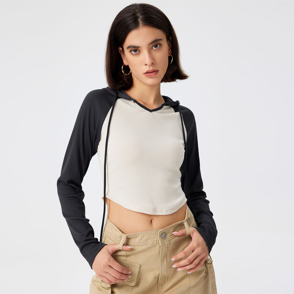 Top de sport court pour femmes avec capuche et manches longues Levoire