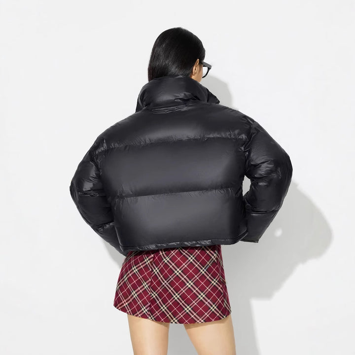 Veste en duvet tendance pour femmes avec épaules tombantes et col tendance Levoire