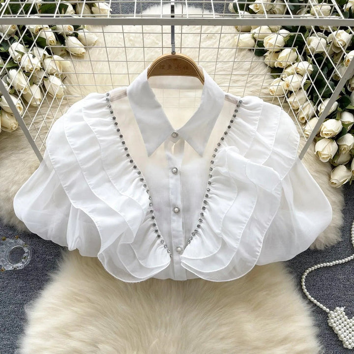 Levoire | Top avec des diamants transparents et fins et des manches bouffantes Blanc Taille libre