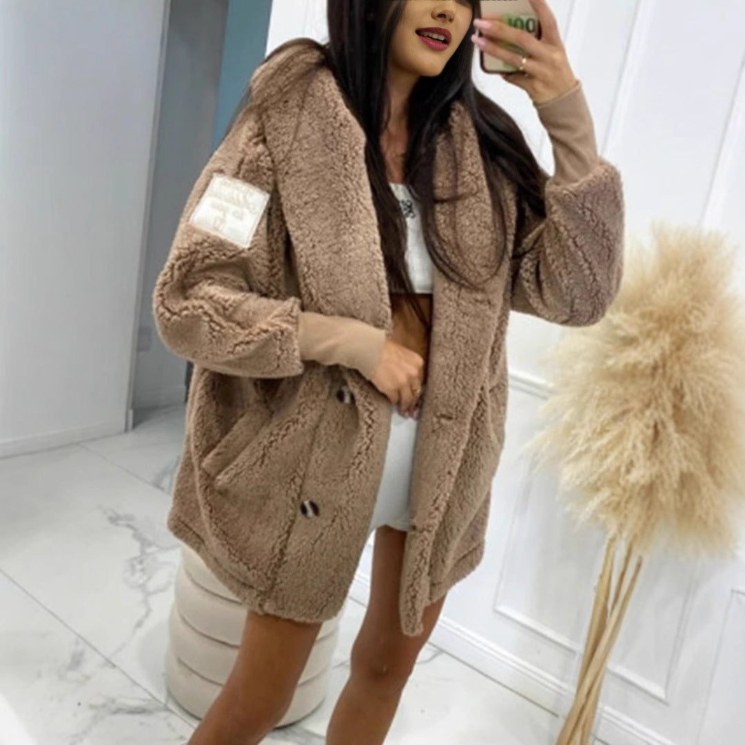 Veste en fourrure teddy pour femmes avec col classique et poches pratiques Levoire