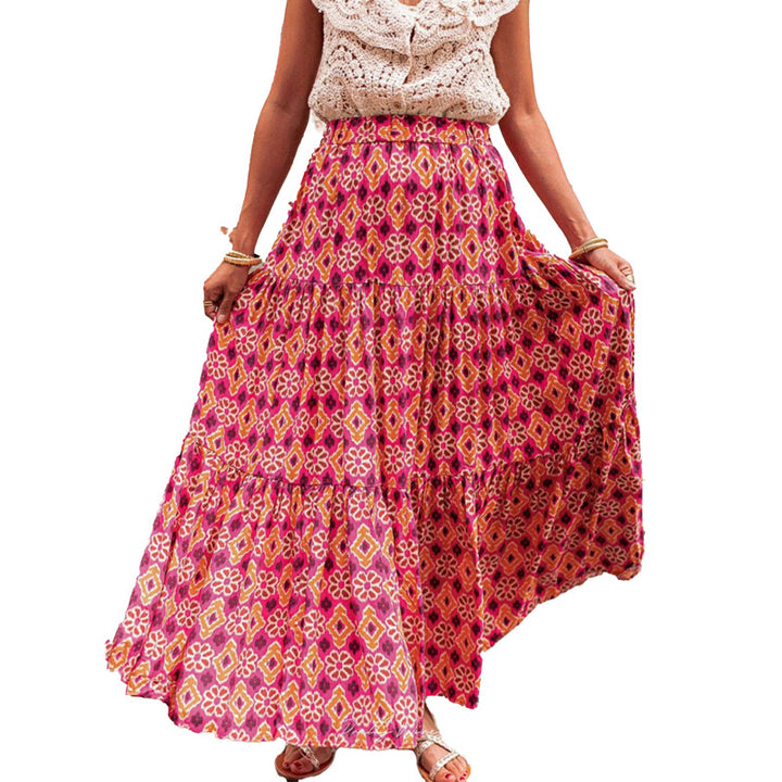 Jupe maxi féminine avec un mélange de motifs vibrants et des volants volumineux Levoire