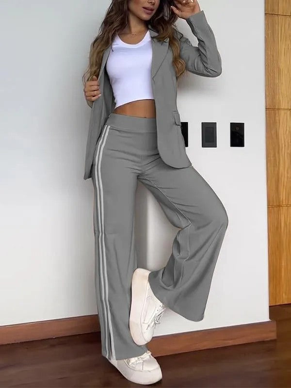 Ensemble de costume féminin à la mode avec ceinture élastique et accents sportifs Levoire