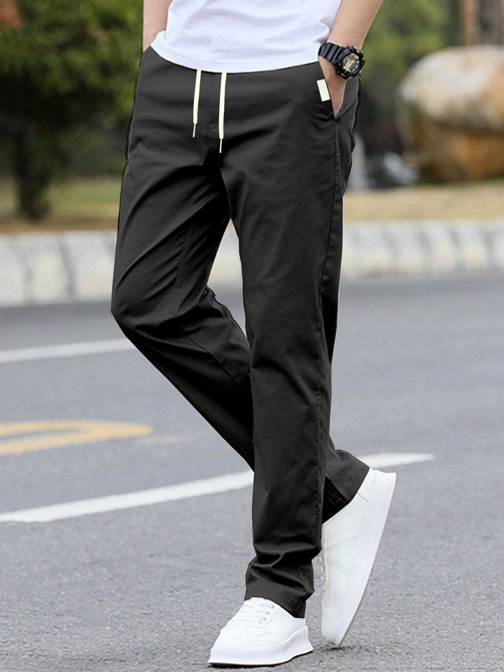 Pantalons de loisirs sportifs pour hommes avec taille élastique et poches latérales modernes Avriane