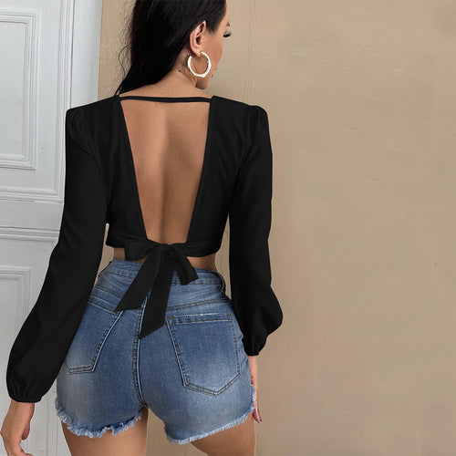Top cropped féminin avec décolleté en V profond et manches bouffantes élégantes Levoire