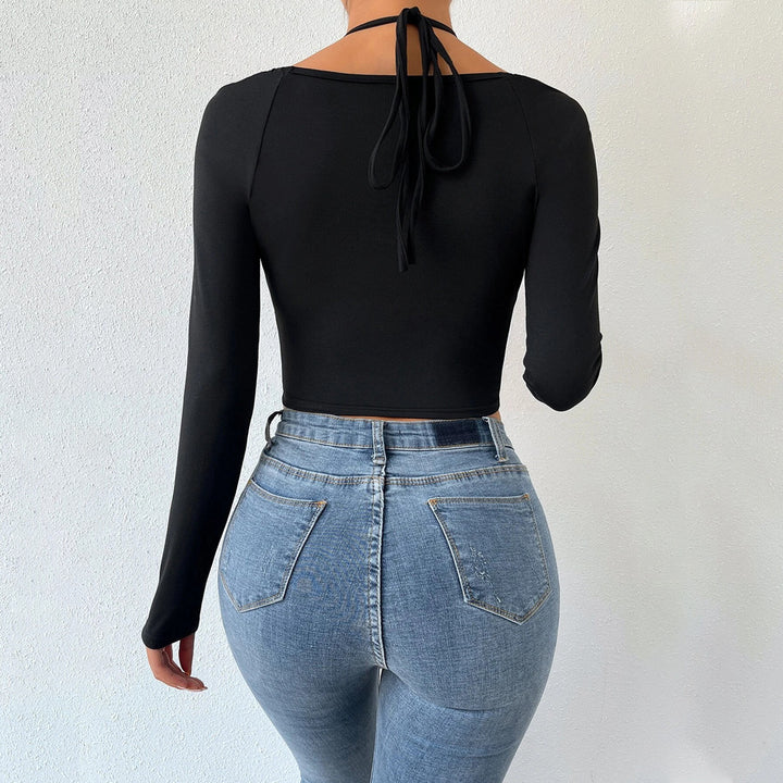 Haut court à manches longues pour femmes avec un design croisé à la mode et des fronces Levoire