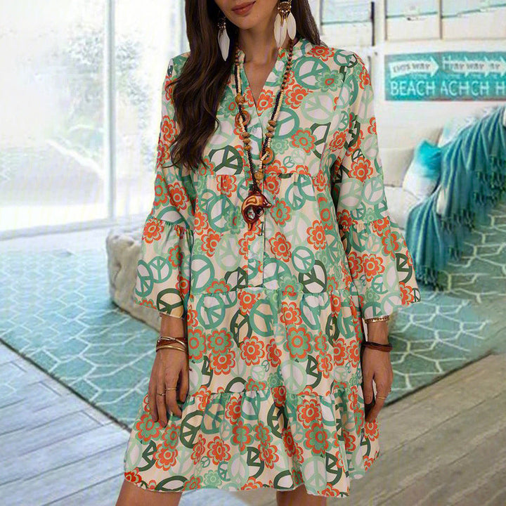 Levoire | Robe à fleurs élégante avec col montant et trois-quarts de manches Vert