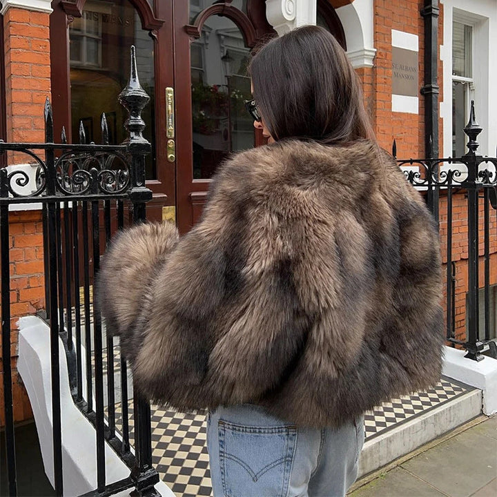Dames manteau en fausse fourrure avec de longues manches douces Avriane