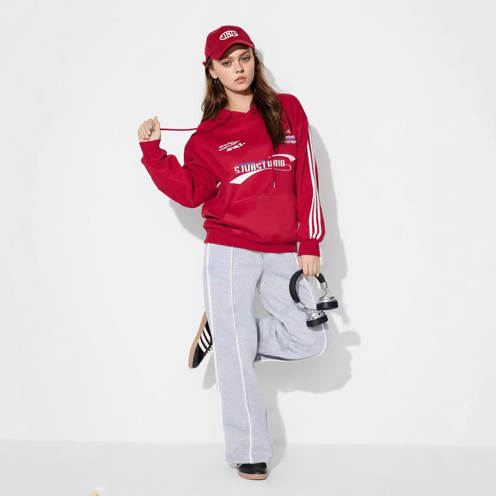 Pantalons d'entraînement décontractés pour femmes dans une coupe moderne avec une taille élastique et des inserts latéraux stylés Levoire
