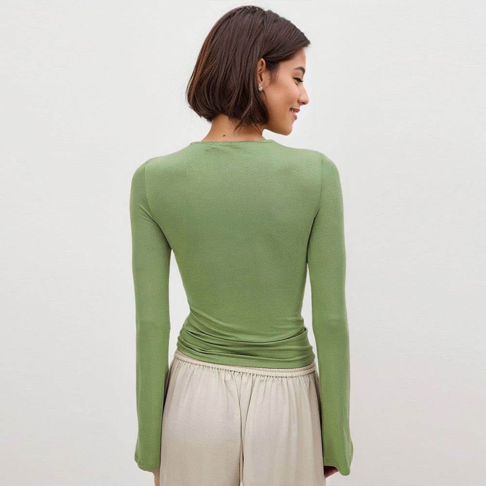 Haut à manches longues pour femmes avec un design innovant en torsion et une découpe sophistiquée Levoire