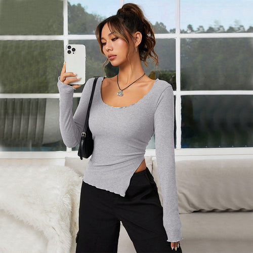 Chemisier femme ajusté à manches longues avec ourlet asymétrique et décolleté élégant Levoire