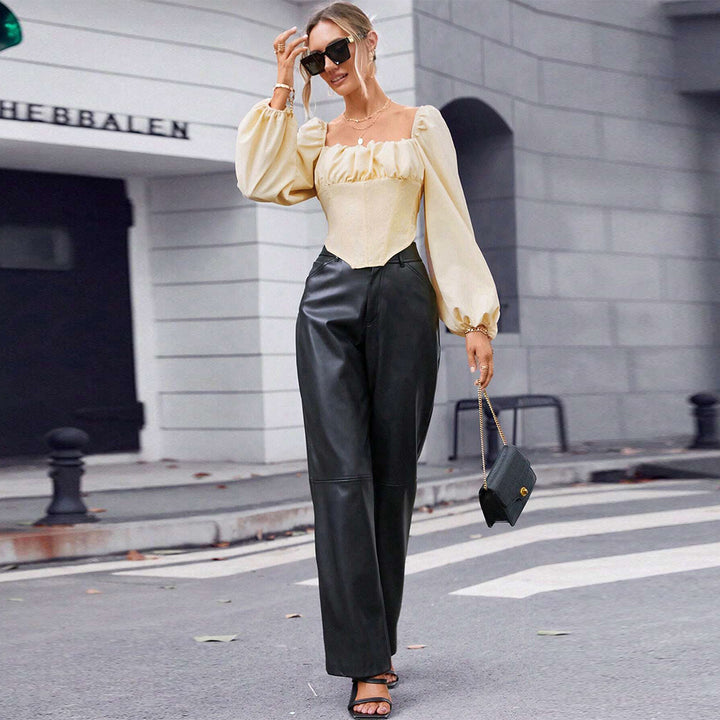 Blouse en dentelle pour femmes avec manches bouffantes et silhouette cintrée Levoire
