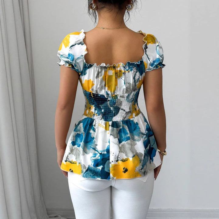 Blouse femme avec volants floraux et taille élastique Levoire
