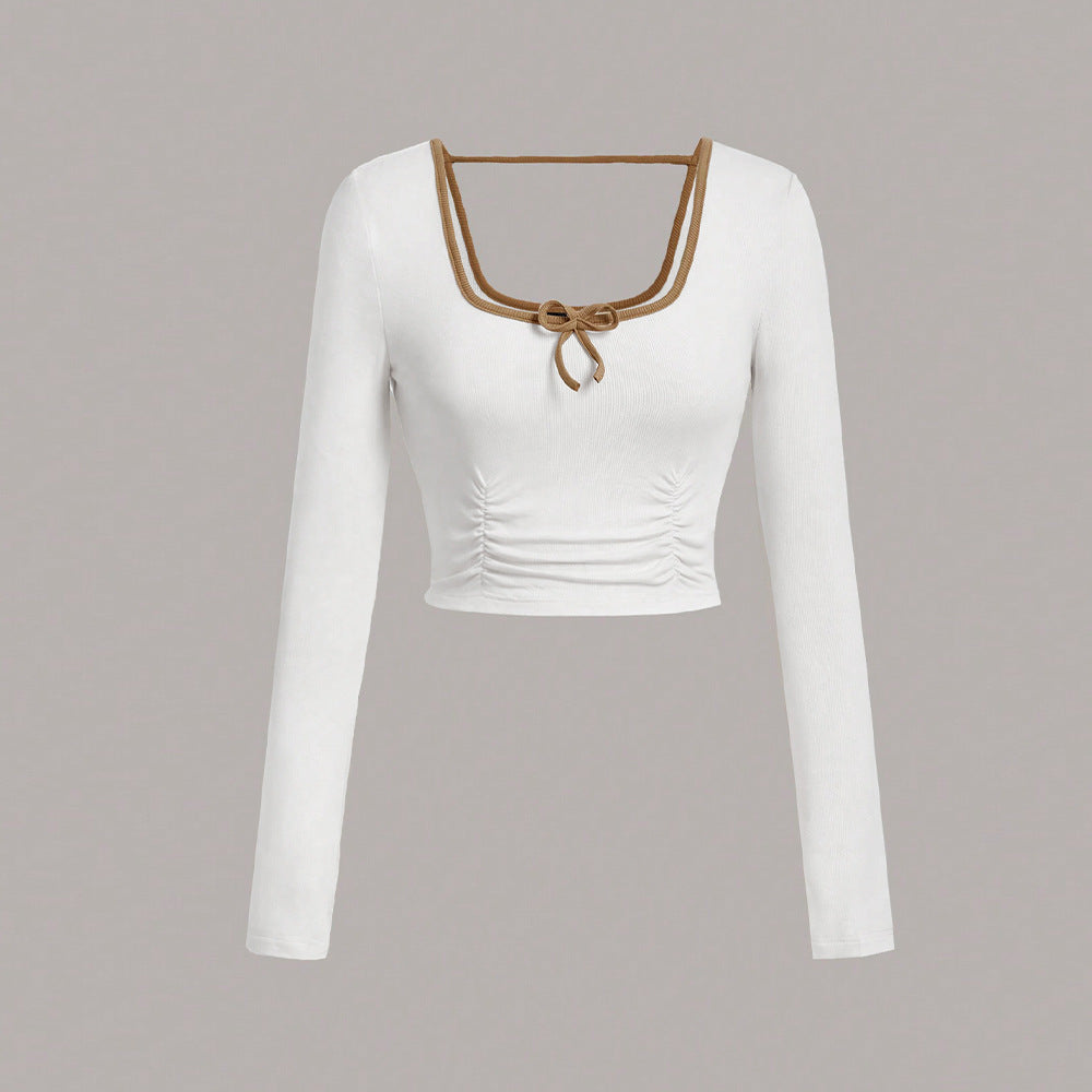 Haut à manches longues cropped pour femmes avec un décolleté carré élégant et des détails de nœud sophistiqués Levoire