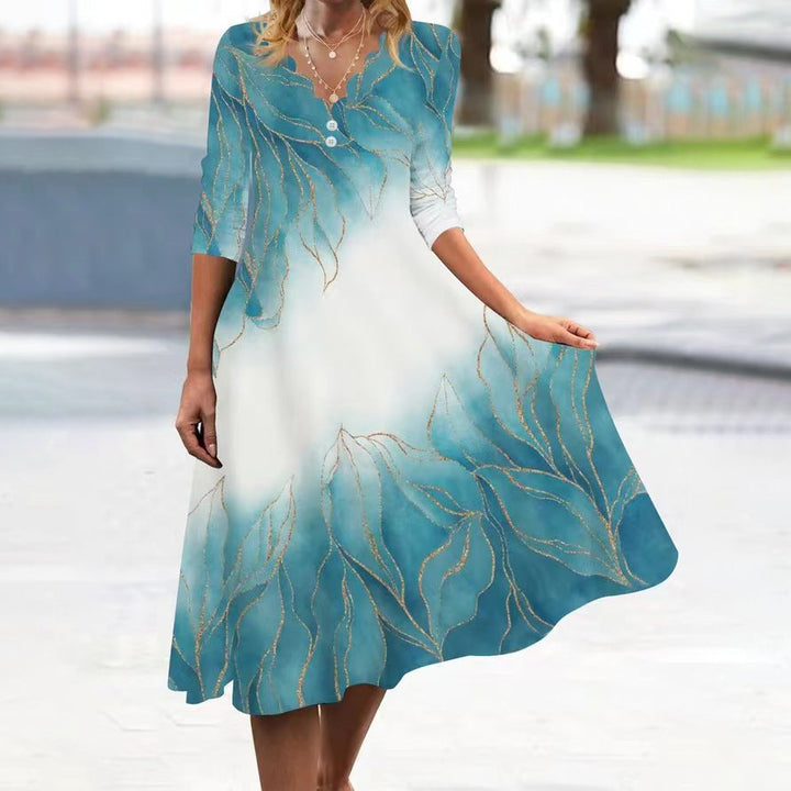 Levoire | Élégante robe mi-longue à manches avec imprimé printanier