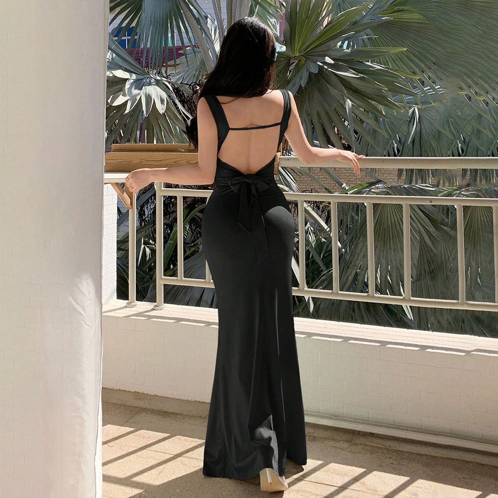Robe de soirée élégante pour femmes avec découpes raffinées au dos et ceinture décorative à nouer Levoire