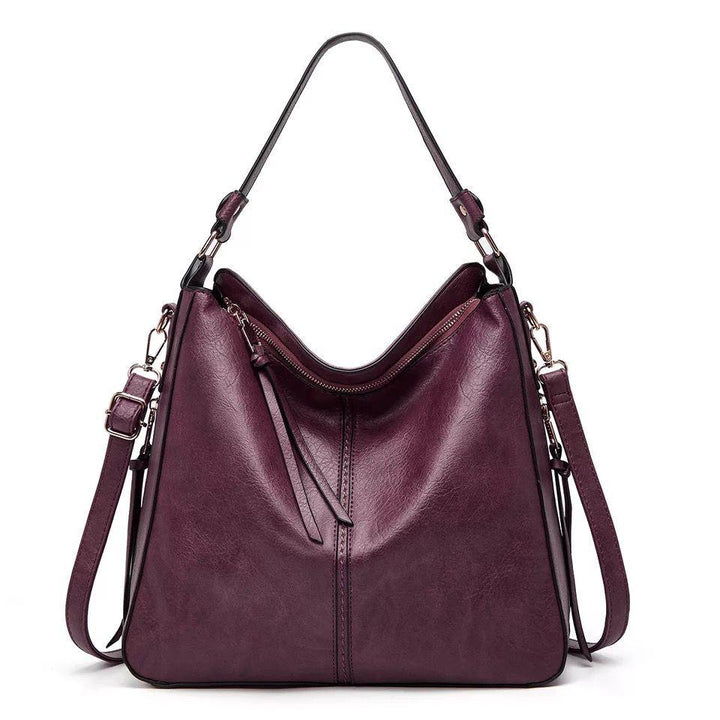Levoire | Sac En Cuir Élégant Avec Grande Capacité Et Poches Latérales Violet